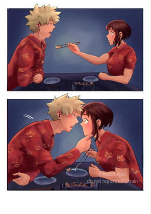 Bakugou and Uraraka sitting across from one another wearing matching red Chinese attire. Uraraka feeds Bakugou food with her chopsticks but he surprises her by tilting her face to kiss him instead.